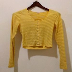 Medium size Garage branded long sleeved button up ribbed material crop top.